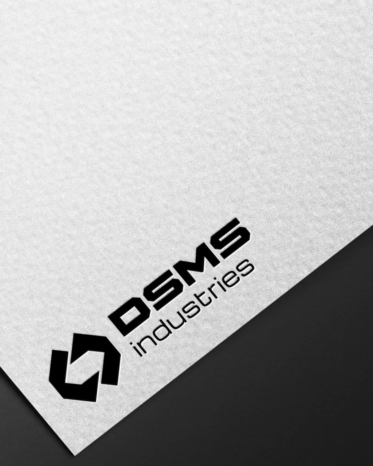 Papier à en-tête DSMS Industries, logo noir sur papier blanc texturé